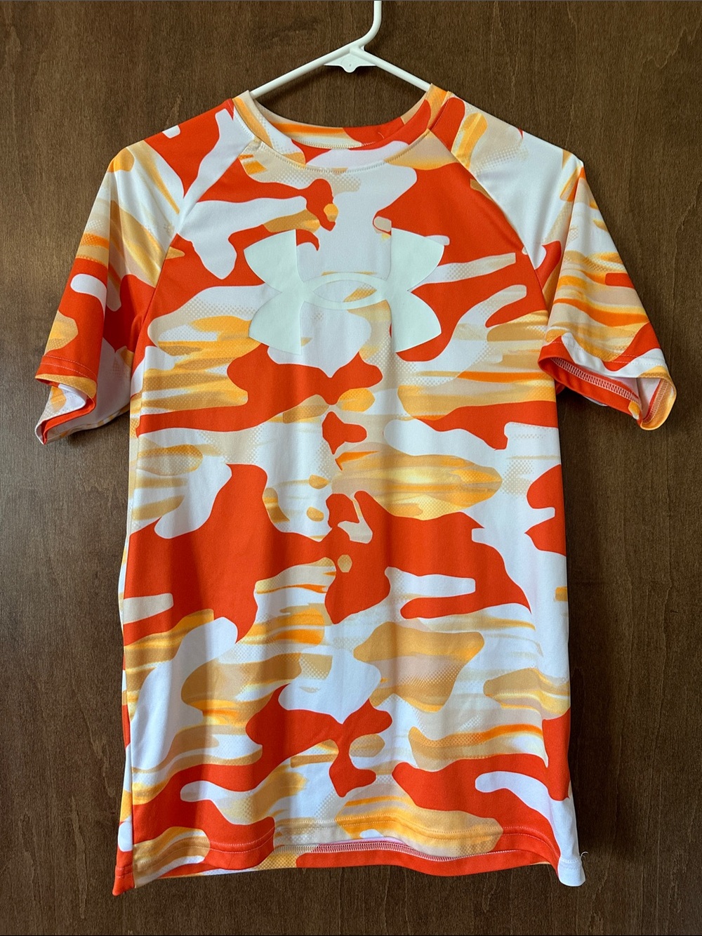 NWOT Kid’s Under Armour White Athletic Tee with Orange and Yellow Print